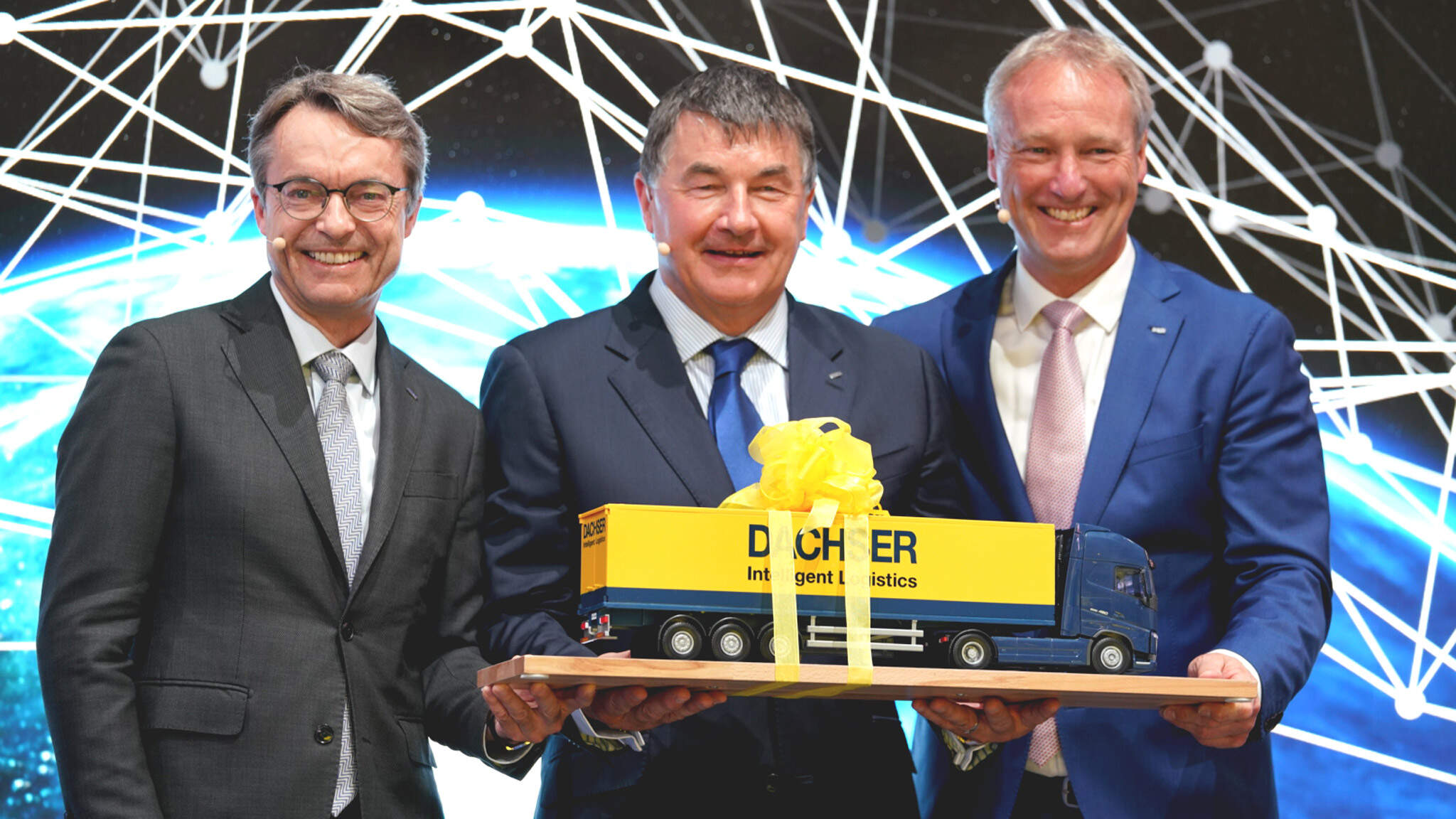 from the left: Bernhard Simon, CEO of DACHSER, Albert Johnston, Managing Director, Johnston Logistics, in future DACHSER Ireland and Michael Schilling, COO Road Logistics at DACHSER, at transport logistic 2019 in Munich. from the left: Bernhard Simon, CEO of DACHSER, Albert Johnston, Managing Director, Johnston Logistics, in future DACHSER Ireland and Michael Schilling, COO Road Logistics at DACHSER, at transport logistic 2019 in Munich.